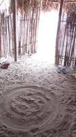Inside a cabin with a sand floor in San Blas, Kuna Yala, Panama