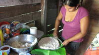 Baking enyucado, cassava cakes, in El Plátano, Panama