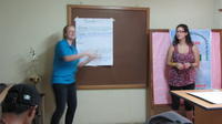 Rachel Teter and another volunteer present at the final agribusiness seminar, Panama