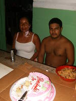 Gabina and sitting with a guest at her birthday party, El Plátano, Panama