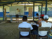 Rachel Teter instructing group of participants at an agribusiness workshop in El Plátano, Panama