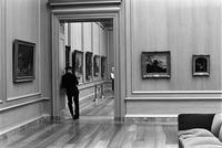 Alternate view of a security guard in an exhibition room in the National Gallery of Art, Washington, D.C.