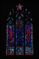 Red and blue stained glass window in the Washington National Cathedral (1977)