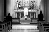 Priest bowing at the Bethlehem Chapel Altar, Washington National Cathedral (1978)