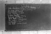 Blackboard with participant jobs at the Potomac School as part of the Adams-Morgan Community Council's Potomac Summer Project, McLean, Virginia
