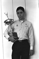 Alternate view of Richard Striner holding the GWU Debate Championship 1968 trophy