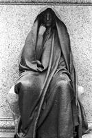 Augustus Saint-Gaudens' Grief statue as part of the Adams Memorial at the Rock Creek Cemetery, Washington, D.C.