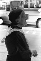 Profile view of an elderly woman with headscarf