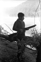 Richard Striner, holding air rifle, at Deep Creek Lake, Maryland (Summer, 1963)