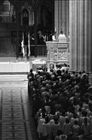 Overhead view of congregation attending a religious service at the Washington National Cathedral (1977)
