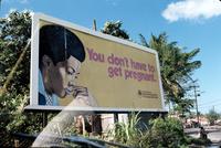 Large billboard advertisement for a family planning clinic