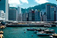 Boats, dock, and skyscrapers of Hong Kong Island, Hong Kong, China