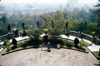 View of Mexico City and the statues of the Niños Héroes from façade of Chapultepec Castle, Mexico City, Mexico
