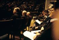 Deans Laura Kummer and Robert Cleary in foreground among faculty onstage at American University, Washington, D.C.