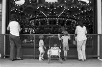 Crowd watching the Dentzel Carousel at Glen Echo Park, Glen Echo, Maryland