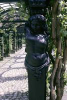 Caryatid figure of a garden trellis at the Rubenshuis, Antwerp, Belgium