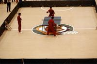 Aerial view of Chinese table tennis team athletes practicing in the arena at the College of William and Mary, Williamsburg, Virginia
