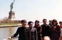 American and Chinese delegations on ferry leaving the Statue of Liberty in New York harbor