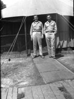 First Lt. Myers and First Lt. Herbert Striner in front of a tent, Camp Kanchrapara (January 1946)