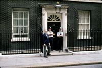 Herb Striner standing alongside others at "10 Downing Street," London, England